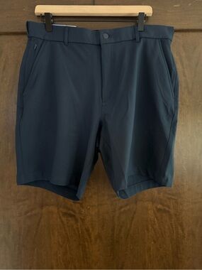 NWT Mens Greg Norman Navy Performance Shorts 8.5 Inseam Size 36